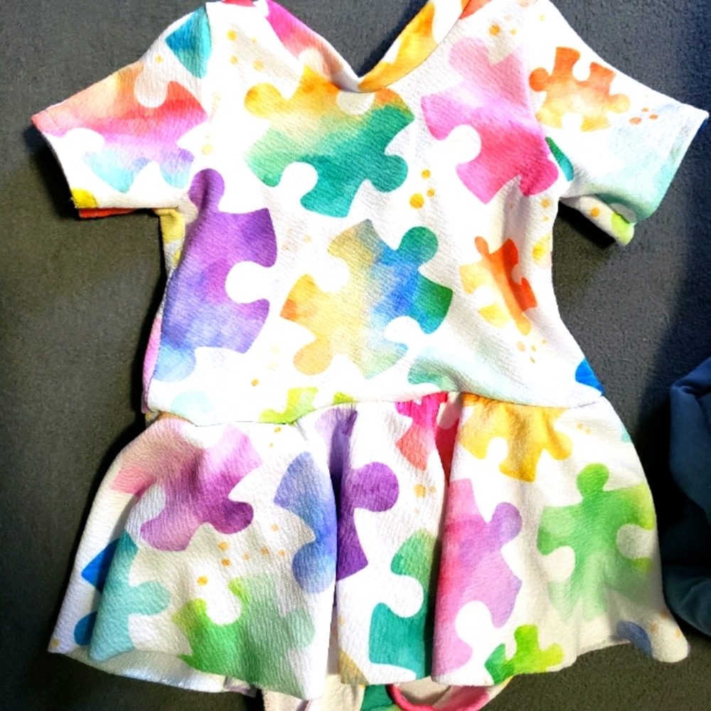 Rainbow Puzzle Piece Skirted Leotard